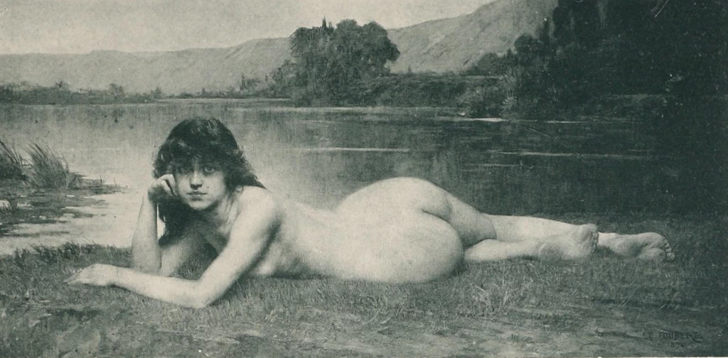 Nudo sdraiato in riva al lago